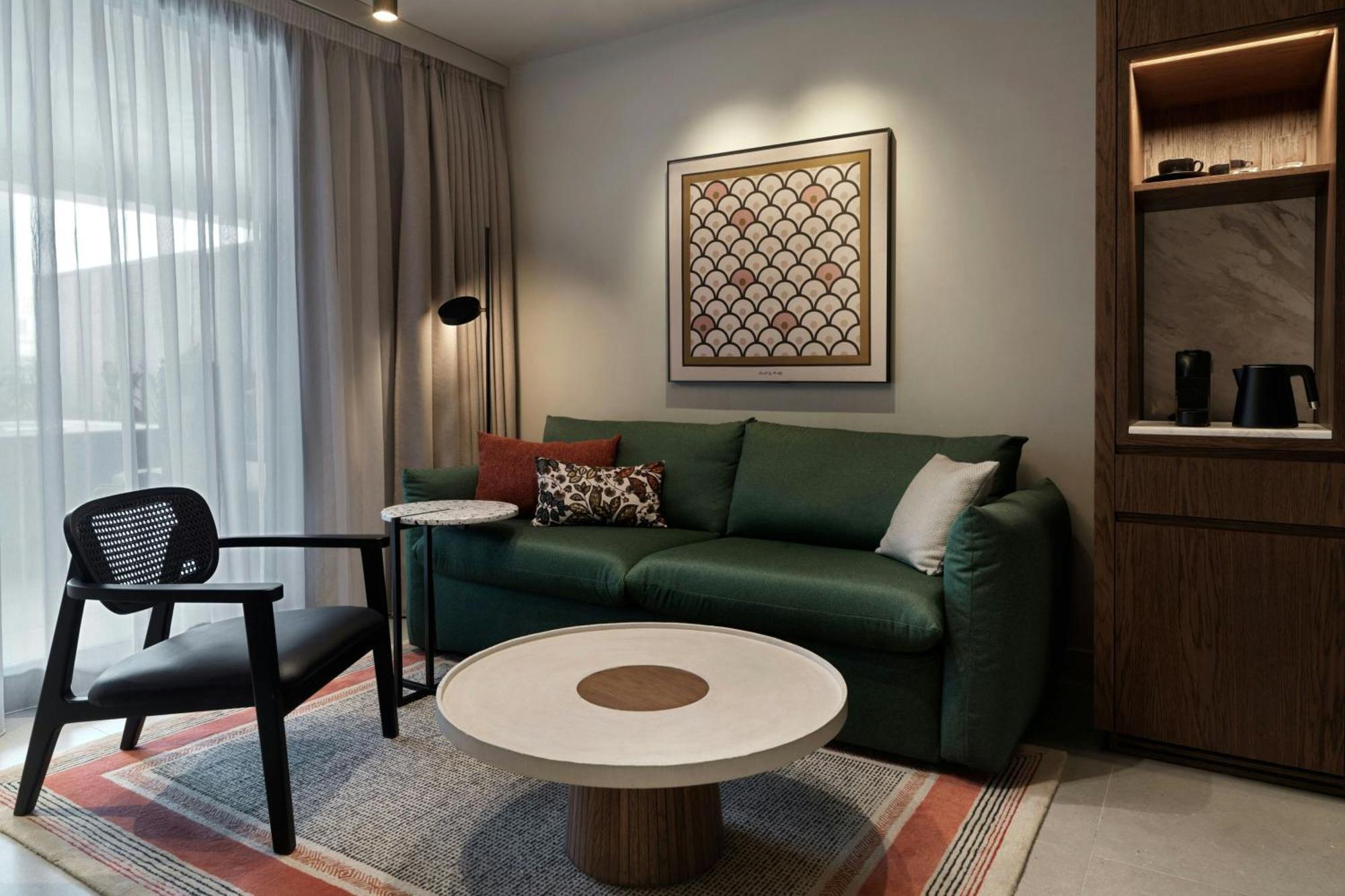 Отель Monasty, Thessaloniki, Autograph Collection Экстерьер фото A living room at the hotel